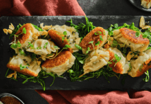 XO-Beef Gyozas and Sauteed Snow Peas Leaves with Creamy Sesame