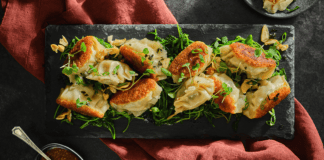 XO-Beef Gyozas and Sauteed Snow Peas Leaves with Creamy Sesame